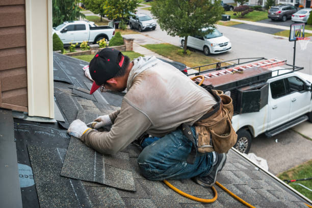 Professional Flat Roof Repair technician working in Adamsville, OH